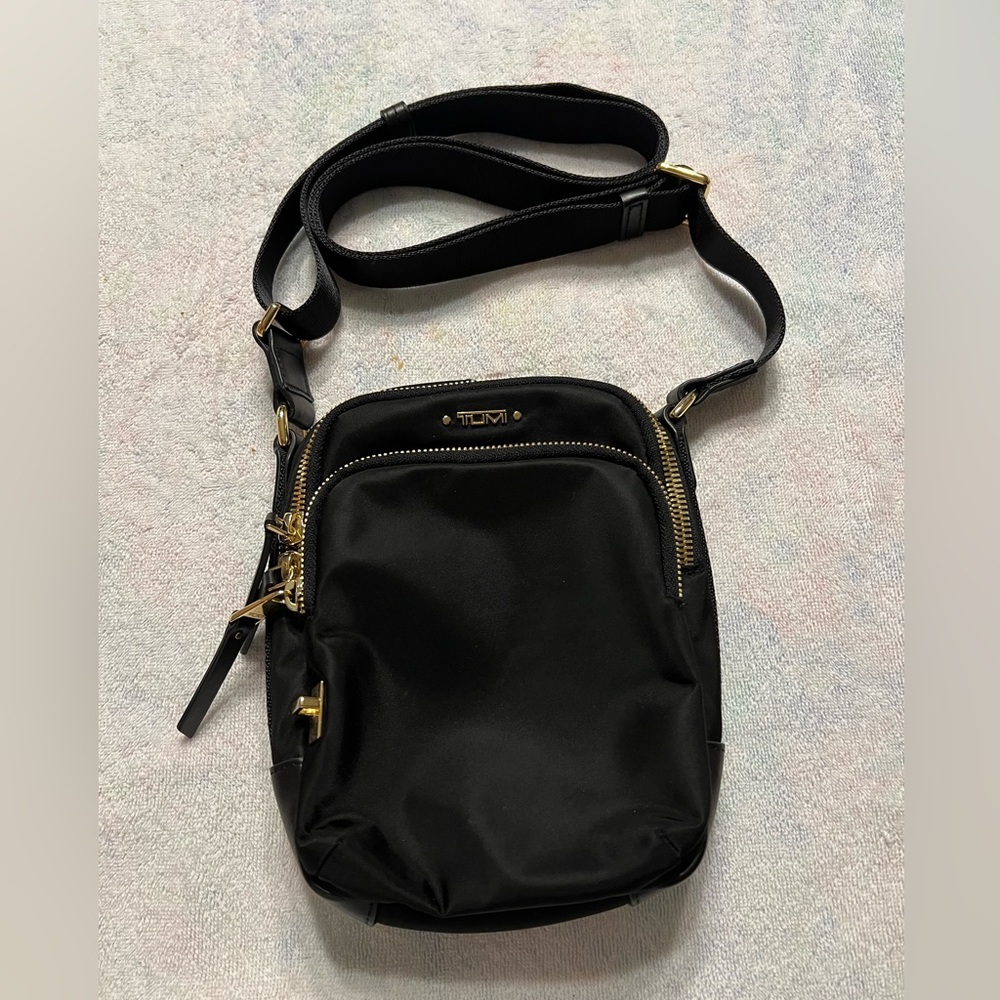 Tumi Black Crossbody with Gold Hardware